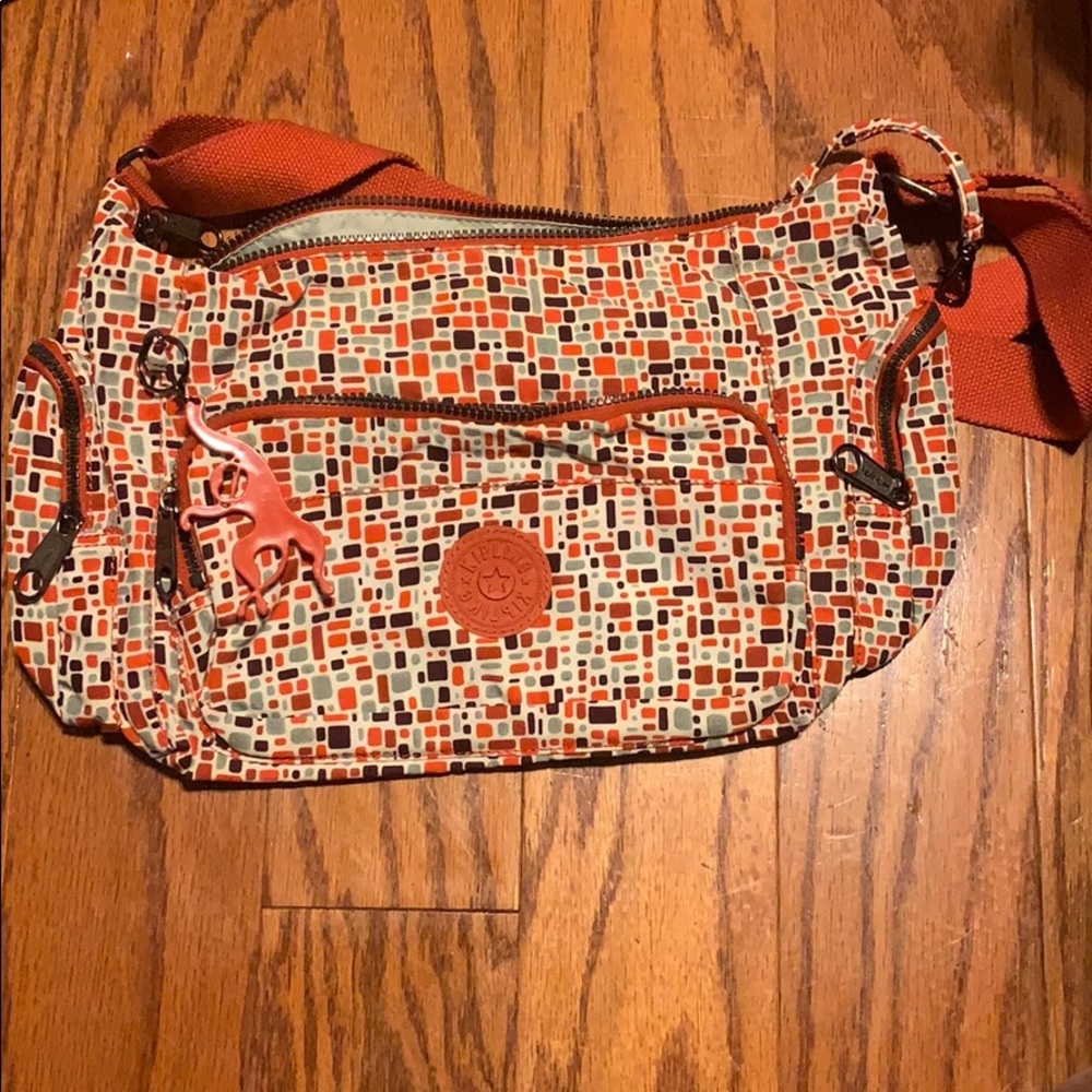 Orange patterned Kipling handbag